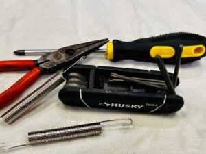 Tools used to replace the broken Breville Smart Oven Pro Door Spring (