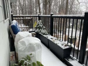 First snow fall and our balcony is covered in snow.