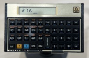A financial calculator with the input value of 212, the water boiling point at sea level.